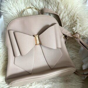 NWT Crossi Nude Bow Backpack Adjustable straps double zip around Gold Hardware